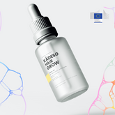 Hair Grow dropper bottle on a light background